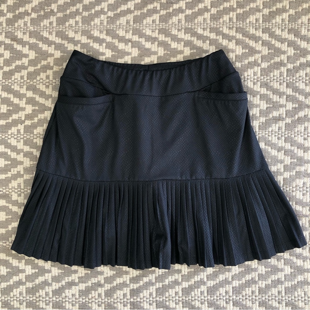 Tail activewear pull on micro pleated Reagan skort snake pattern